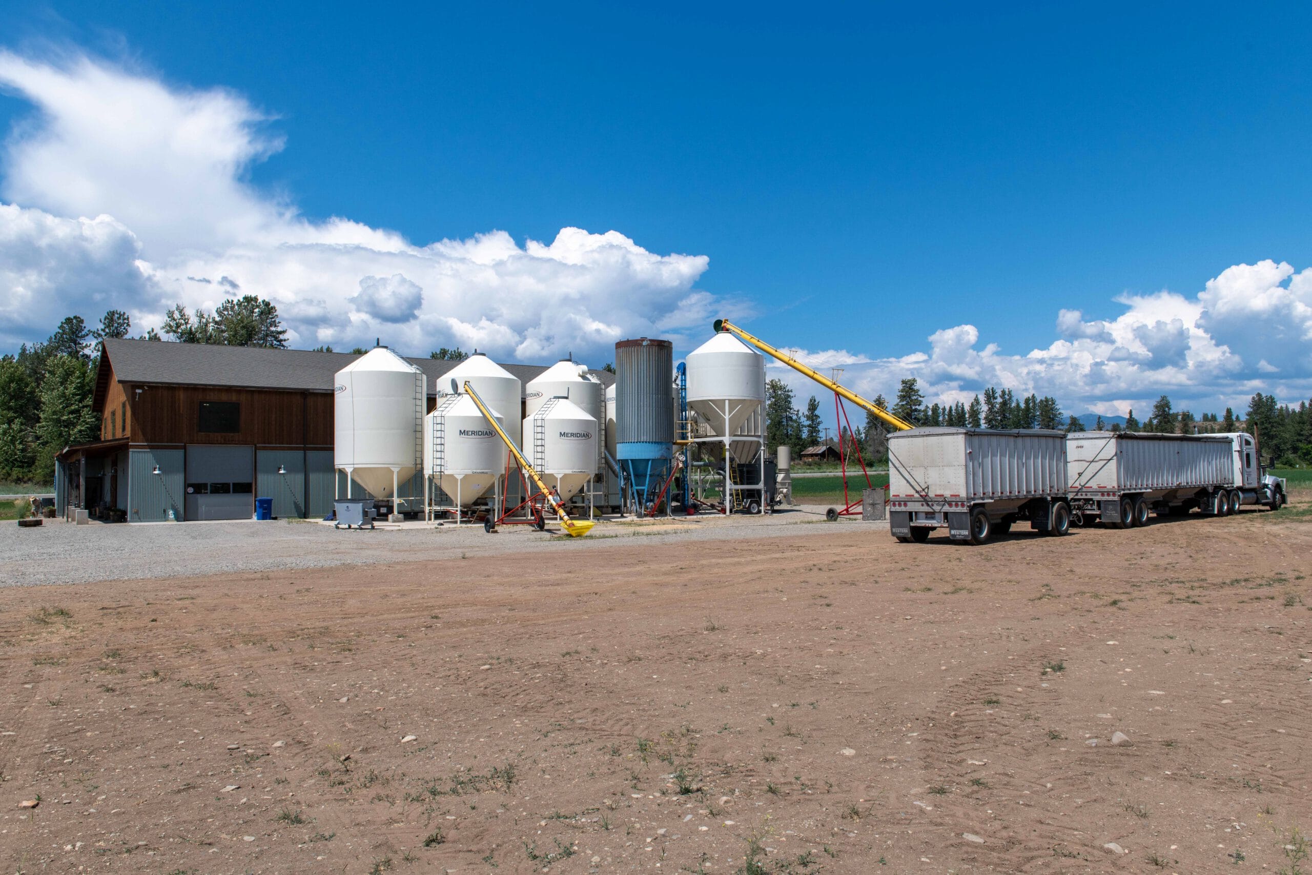 Bluebird Grain Farms Granary, ancient grain, organic grain and flour processing facility, grain delivered to granary, steel grain silos, Methow Valley local business 